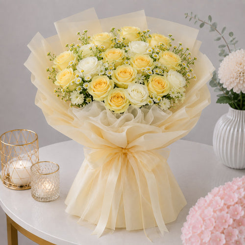 Yellow and White Rose Bouquet with Chamomile in Cream Wrap